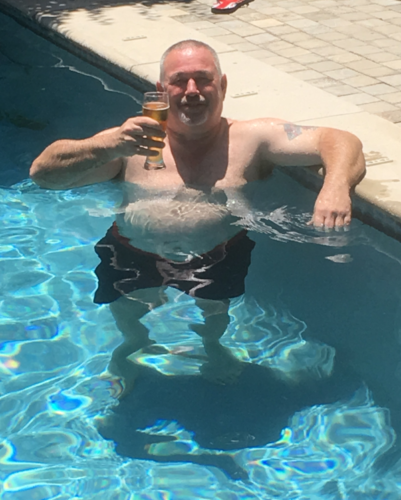 Large person in the hotel Pool